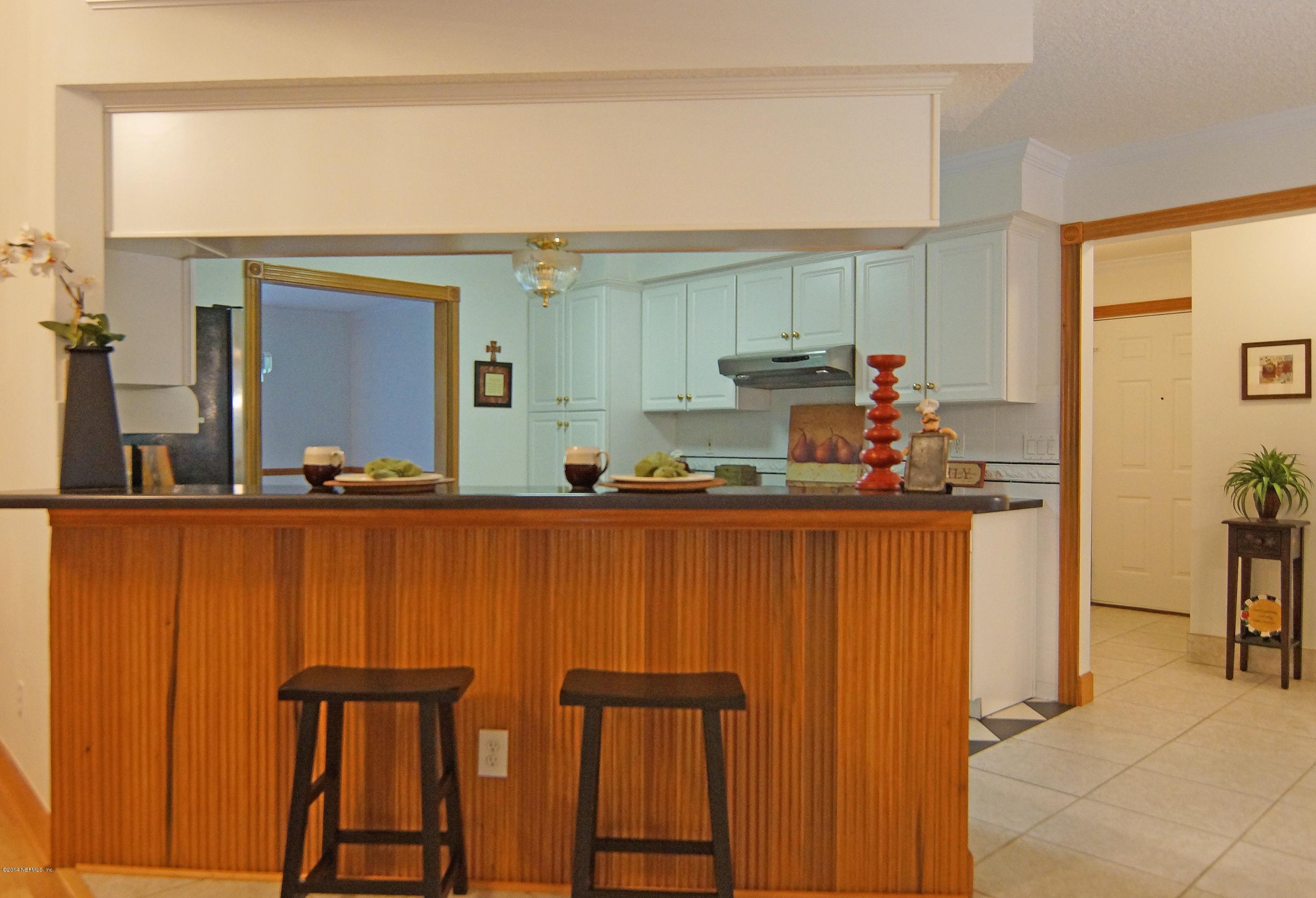 4743 Herton Road Jacksonville, FL 32258 - Photo 13 of 34 Breakfast Bar with Wood Trim