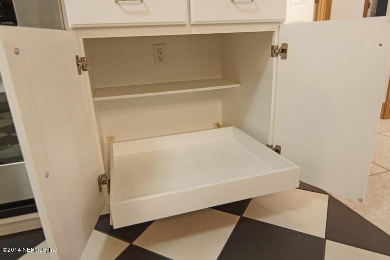 4743 Herton Road Jacksonville, FL 32258 - Photo 15 of 34 Handy Pull-out Shelves