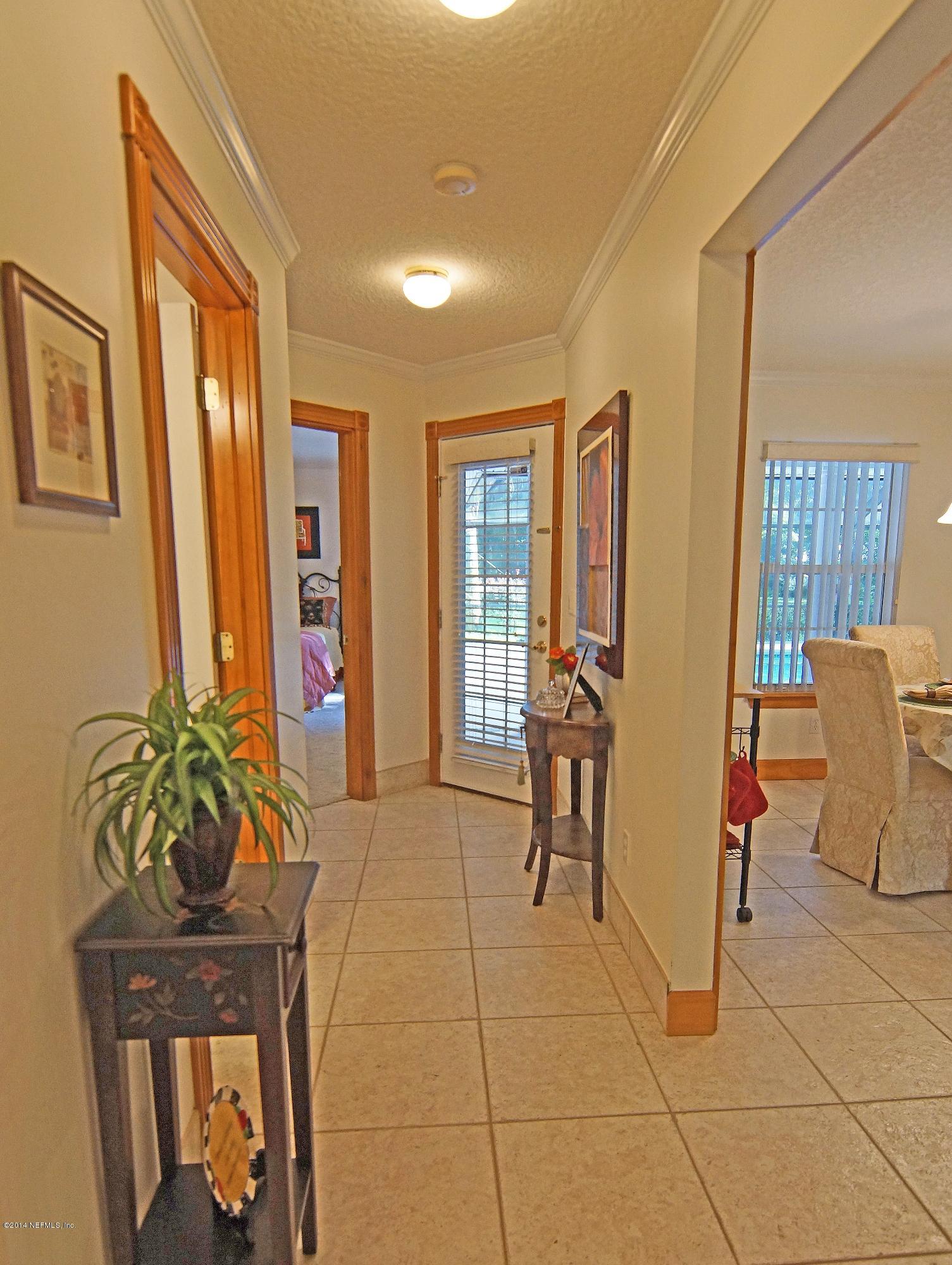 4743 Herton Road Jacksonville, FL 32258 - Photo 16 of 34 Hallway Off Kitchen to Pool Enclosure