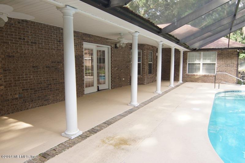 4743 Herton Road Jacksonville, FL 32258 - Photo 28 of 34 Covered Lanai in Pool Enclosure