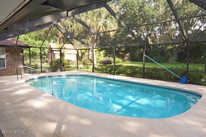 4743 Herton Road Jacksonville, FL 32258 - Photo 3 of 34 Screen Enclosed Heated Pool
