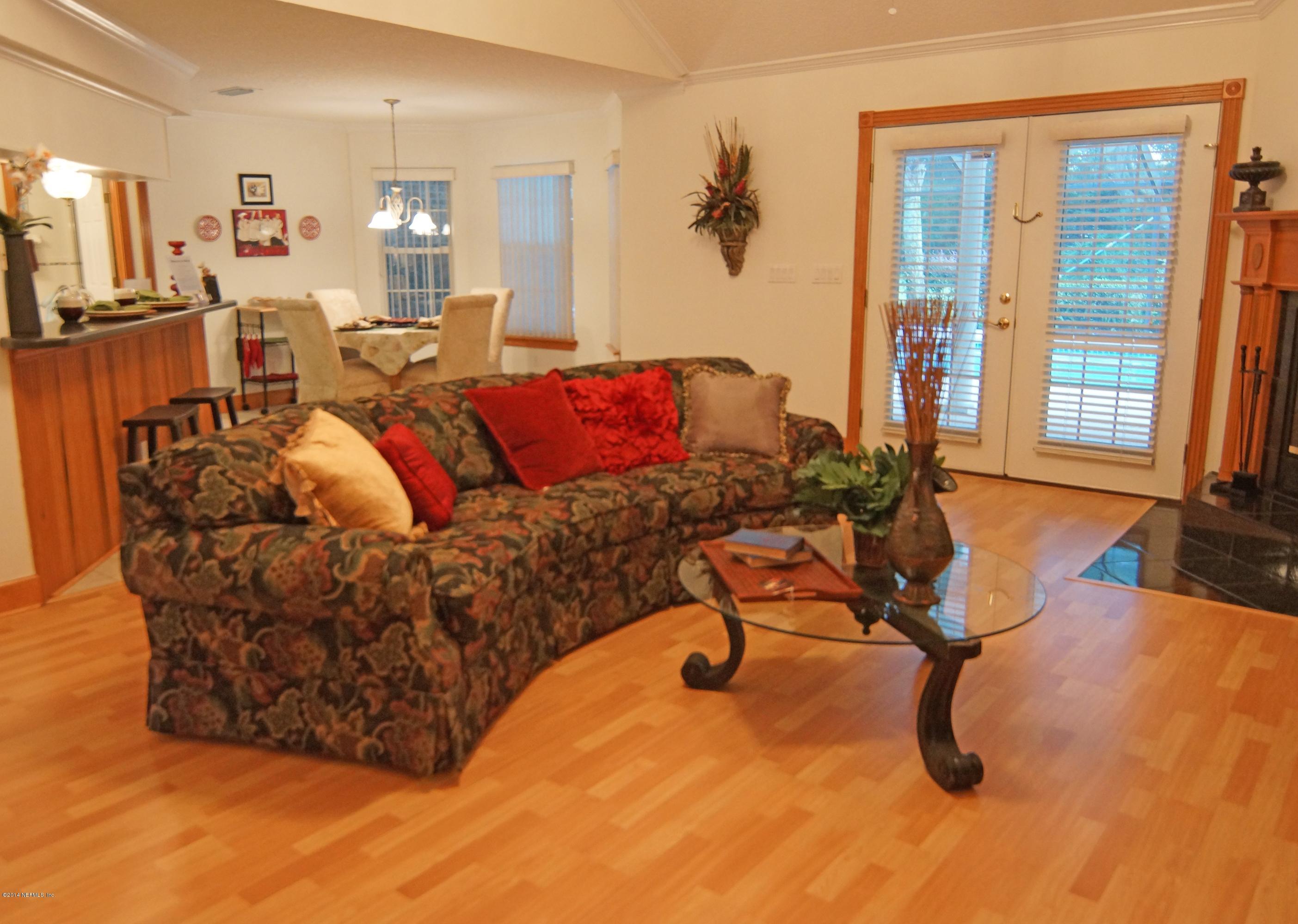 4743 Herton Road Jacksonville, FL 32258 - Photo 9 of 34 Spacious Great Room with Wood Laminate