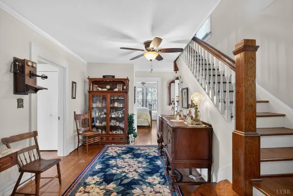 a bedroom with furniture and a chandelier