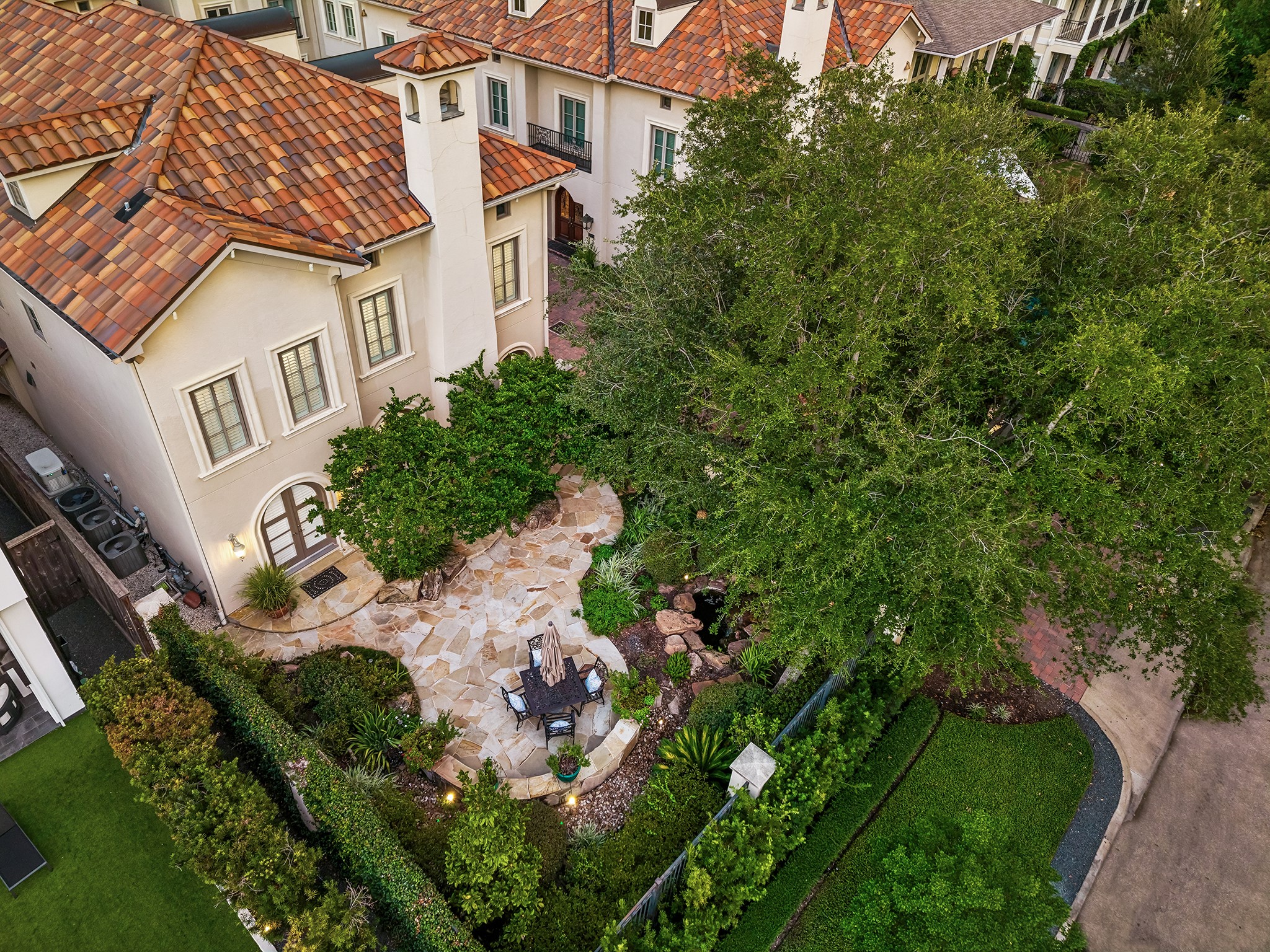 5034 Tangle Lane Houston, TX 77056 - Photo 40 of 50 An aerial perspective highlights the residence's private setting, substantial garden areas and the remarkable amount of greenery surrounding the home.