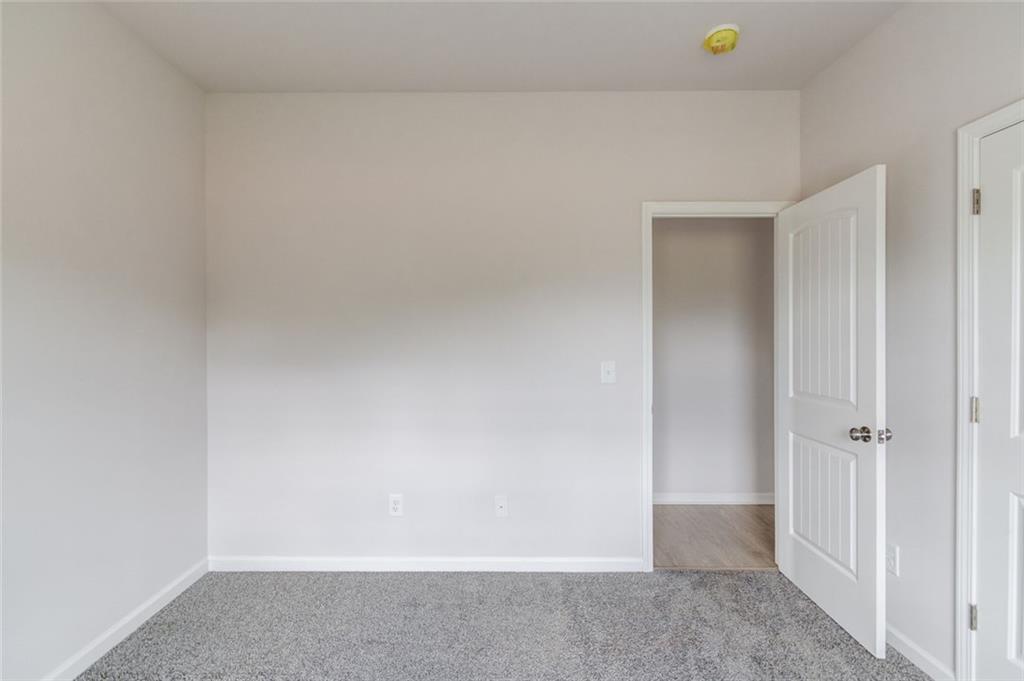 255 Cool Springs Road, Unit 7 Clarkesville, GA 30523 - Photo 29 of 42 a view of an empty room