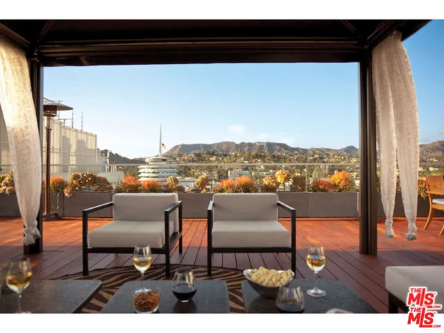 a view of a terrace with furniture