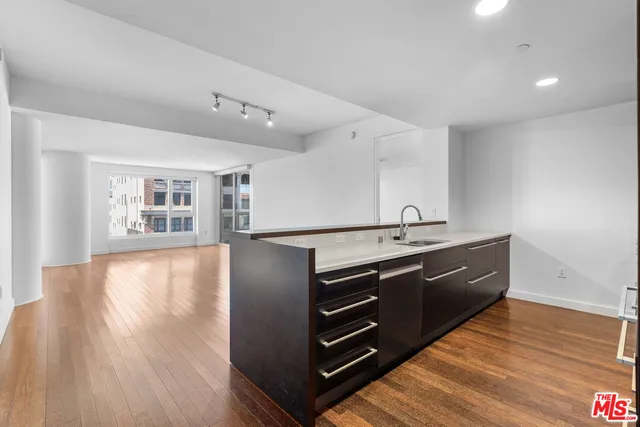 a view of kitchen with wooden floor