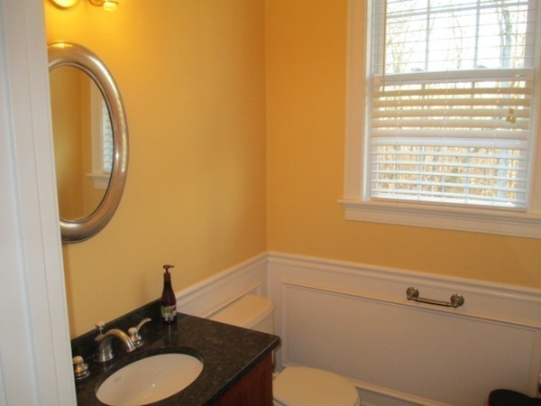 23 Spring Street Rehoboth, MA 02769 - Photo 15 of 27 a bathroom with a sink mirror and toilet