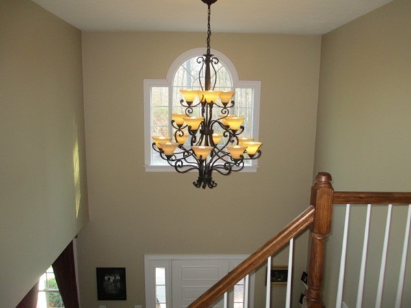 23 Spring Street Rehoboth, MA 02769 - Photo 17 of 27 a view of a hallway with chandelier