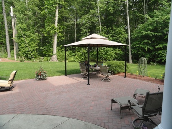 23 Spring Street Rehoboth, MA 02769 - Photo 4 of 27 a view of backyard with a patio and plants