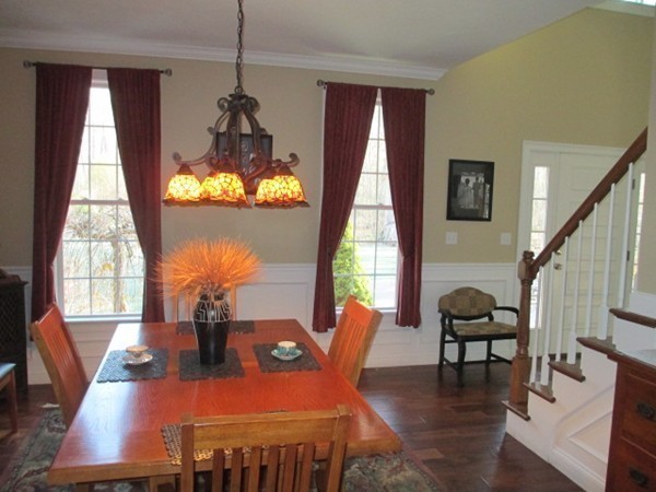23 Spring Street Rehoboth, MA 02769 - Photo 6 of 27 a dining room with furniture a chandelier and wooden floor