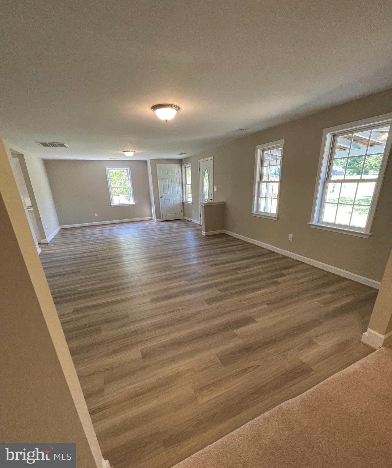 5831 Ridge Road Spotsylvania, VA 22551 - Photo 22 of 32 Large living area for all to gather.