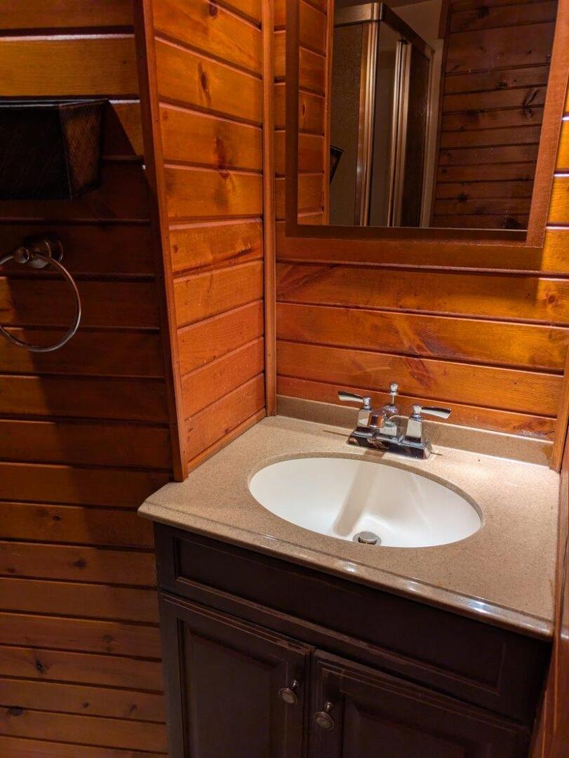 21W230 Pershing Avenue Lombard, IL 60148 - Photo 22 of 41 a bathroom with a sink and a mirror