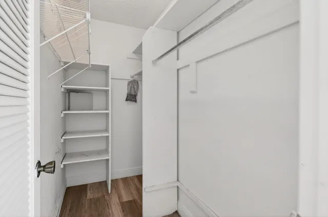 a bathroom with a sink mirror toilet and bathtub
