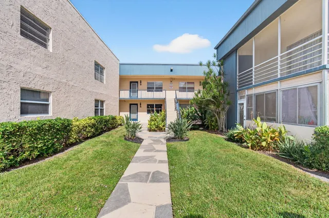 a view of a golf course with a lake