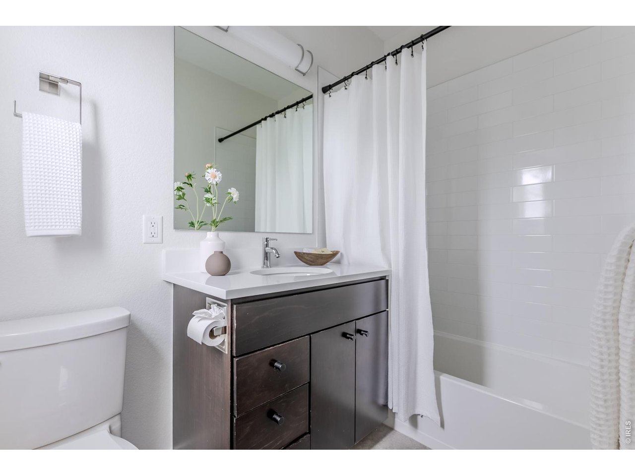 402 West Baseline Road, Unit H Lafayette, CO 80026 - Photo 20 of 45 The en-suite bath offers clean, timeless finishes and an ease of use that feels intuitive.