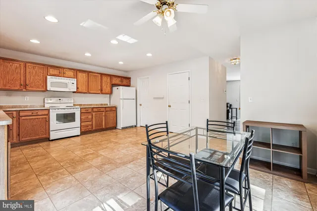 a view of a dining room kitchen and a window