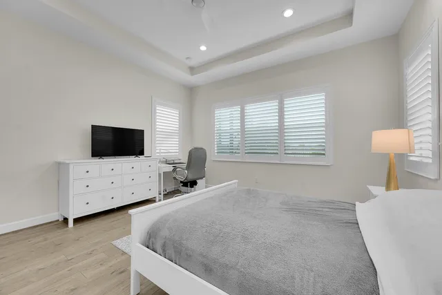 a view of workspace and bedroom