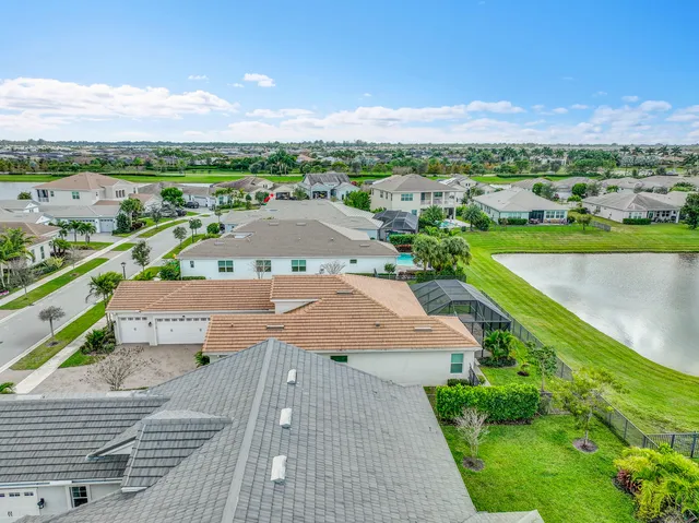 an aerial view of a house with a garden