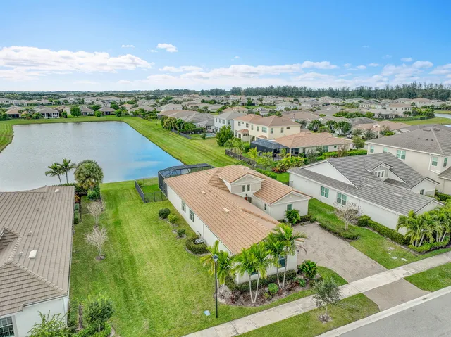 a view of a building with a yard