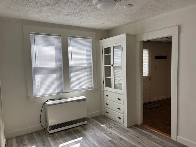 wooden floor and window in a room