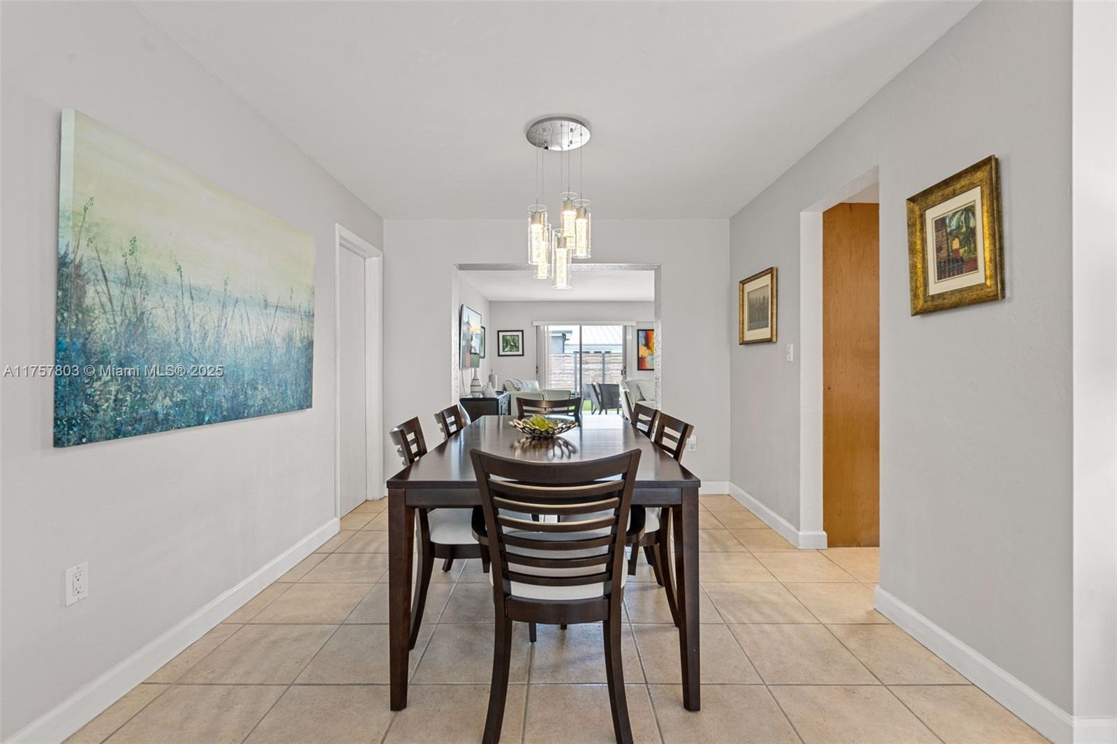 6311 Southwest 93rd Court Miami, FL 33173 - Photo 7 of 41 a dining room with furniture and window