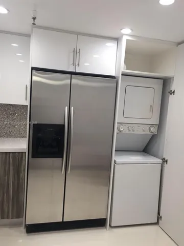 a kitchen with a stove and a microwave
