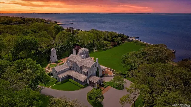 an aerial view of a house with mountain view