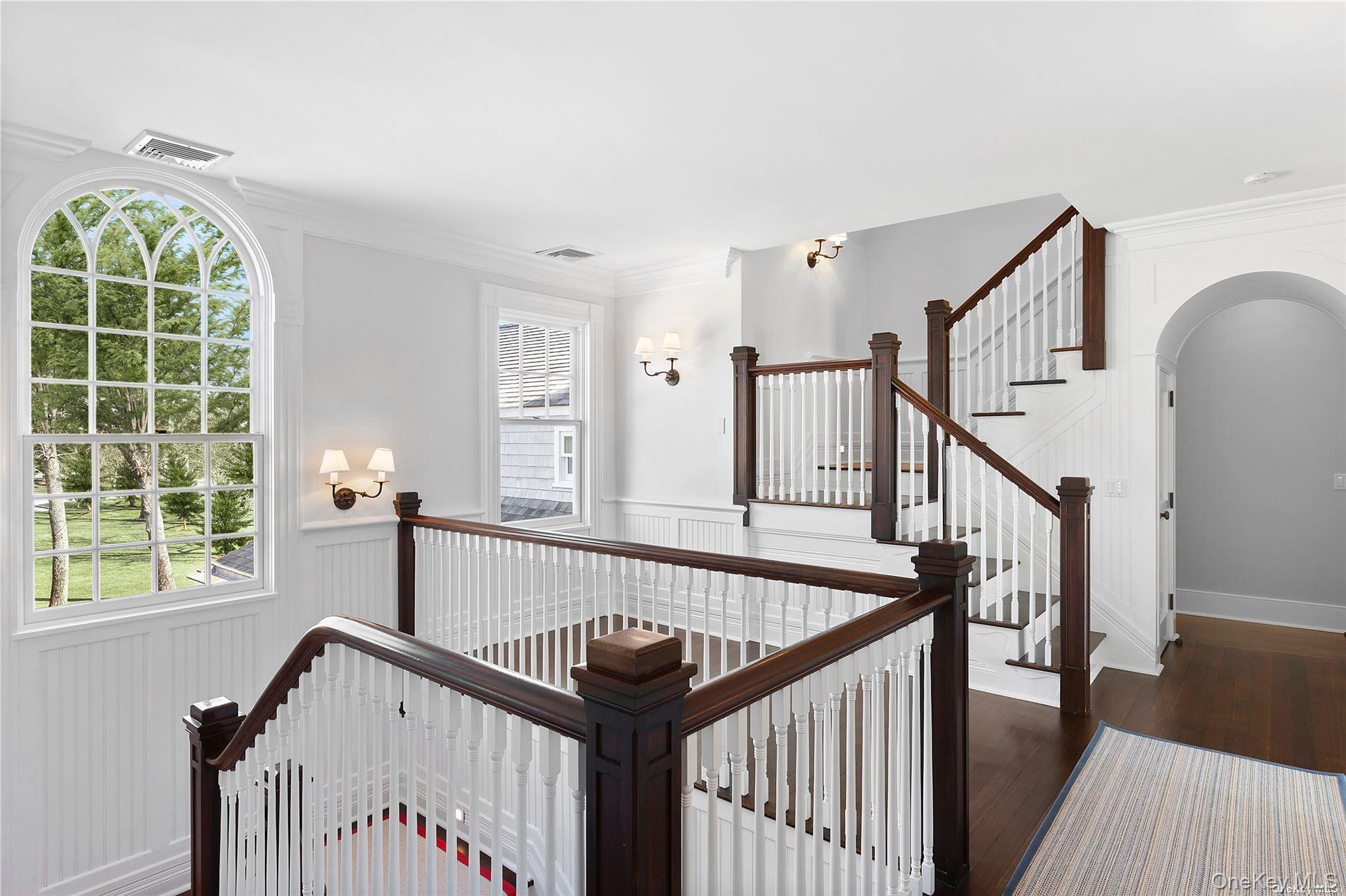 74 Cedar Lane West Remsenburg, NY 11960 - Photo 14 of 37 a view of entryway with a window and wooden floor