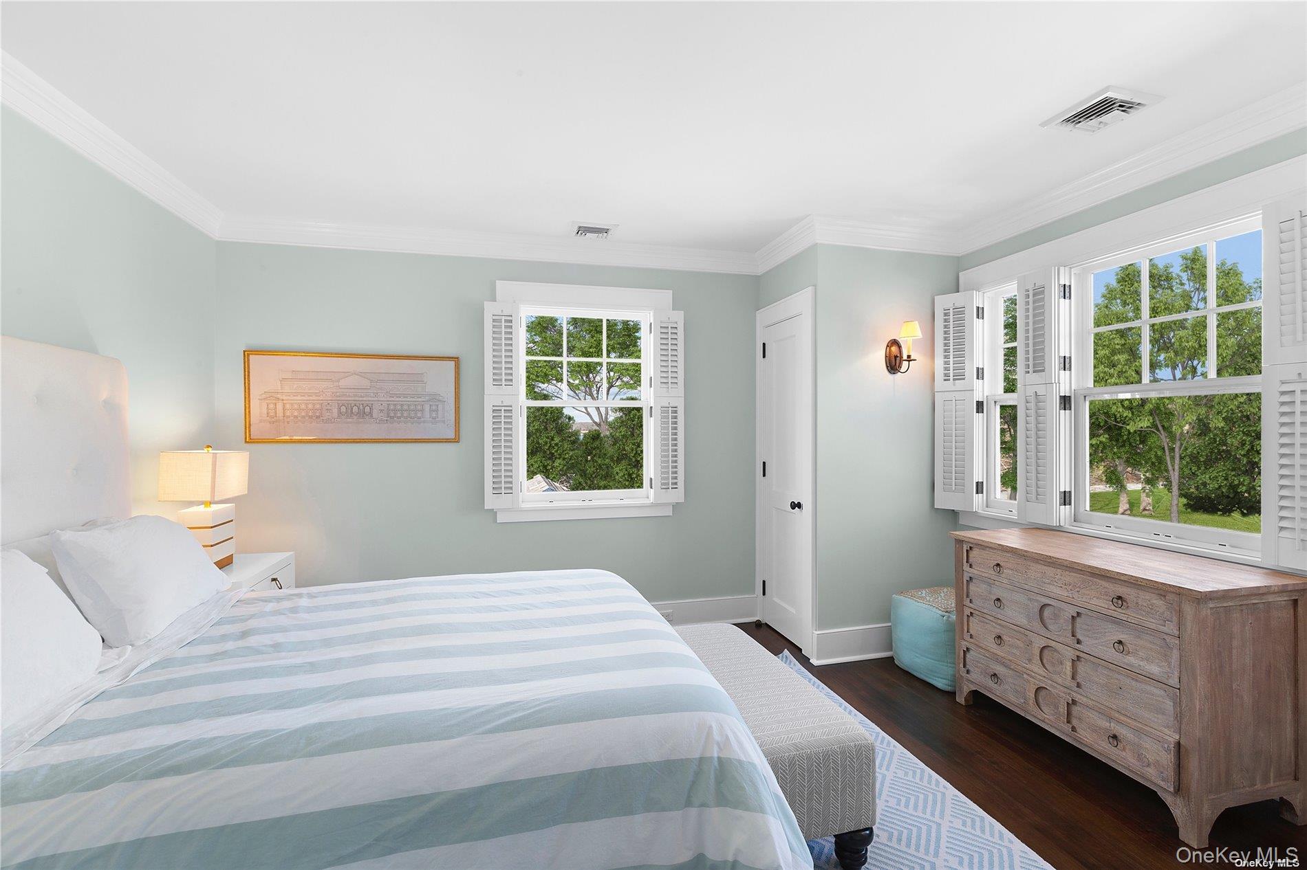 74 Cedar Lane West Remsenburg, NY 11960 - Photo 17 of 37 a bedroom with a bed a window and dresser