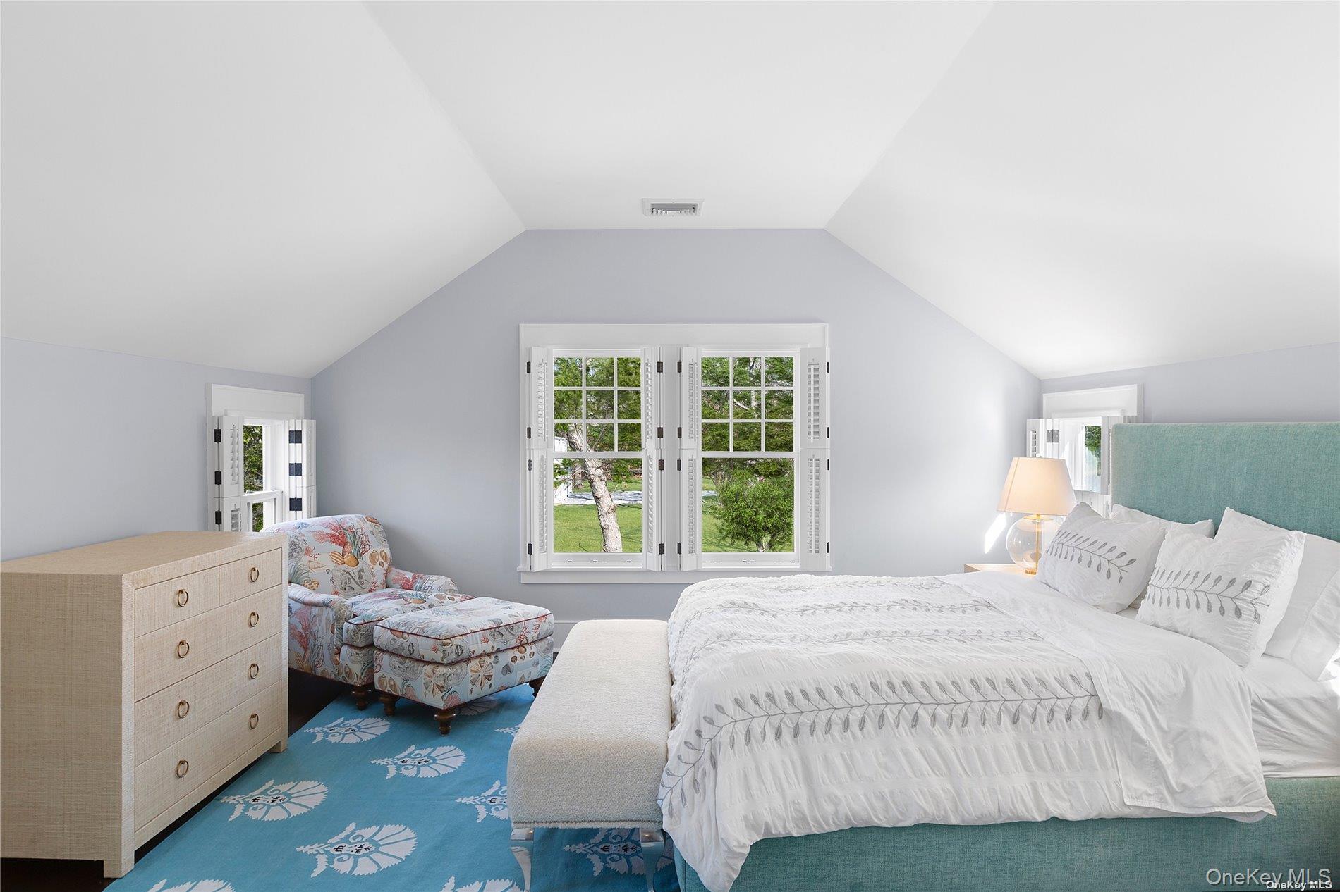 74 Cedar Lane West Remsenburg, NY 11960 - Photo 19 of 37 a bedroom with a bed and a window