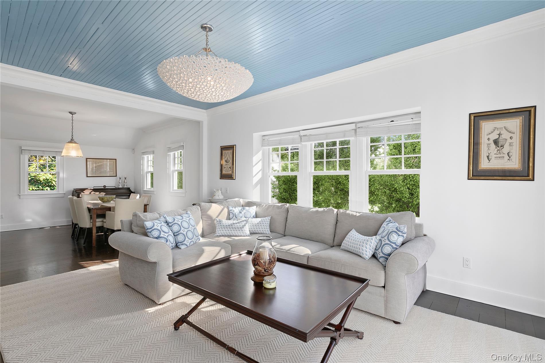 74 Cedar Lane West Remsenburg, NY 11960 - Photo 26 of 37 a living room with furniture and a window