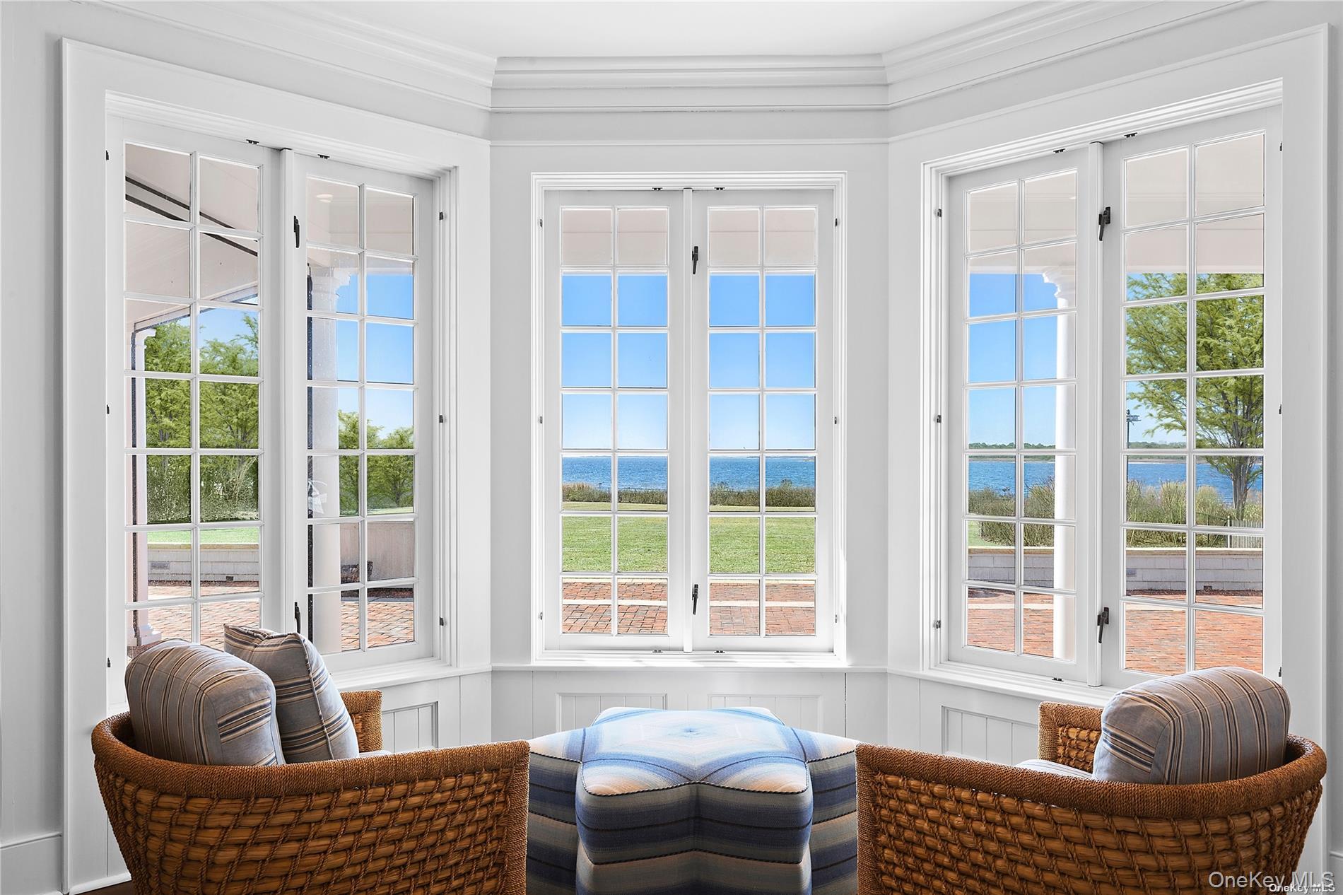 74 Cedar Lane West Remsenburg, NY 11960 - Photo 5 of 37 a living room with furniture and a large window