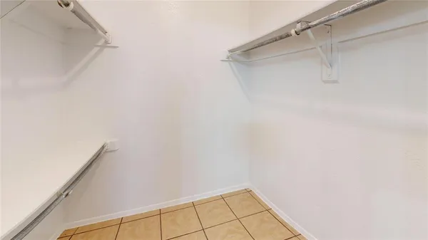 a balcony with trees in front of it