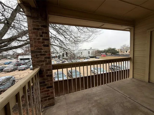 a view of living room with furniture and rug