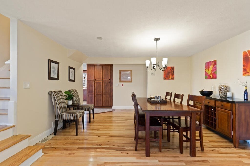 73 Longfellow Road Reading, MA 01867 - Photo 12 of 32 a view of a dining room with furniture
