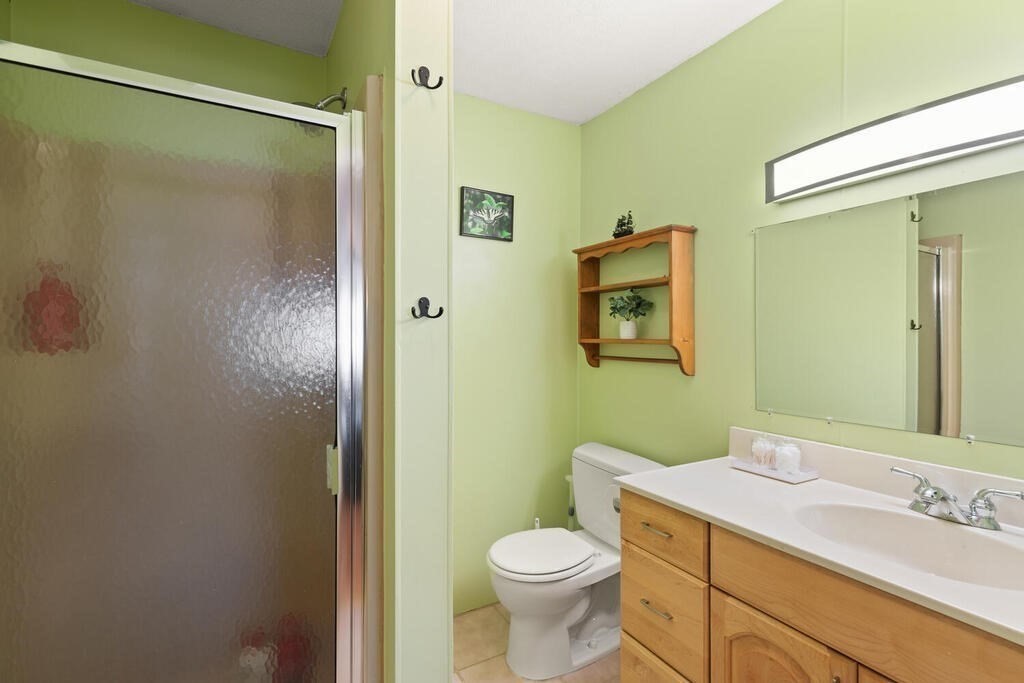 73 Longfellow Road Reading, MA 01867 - Photo 17 of 32 a bathroom with a sink and a mirror