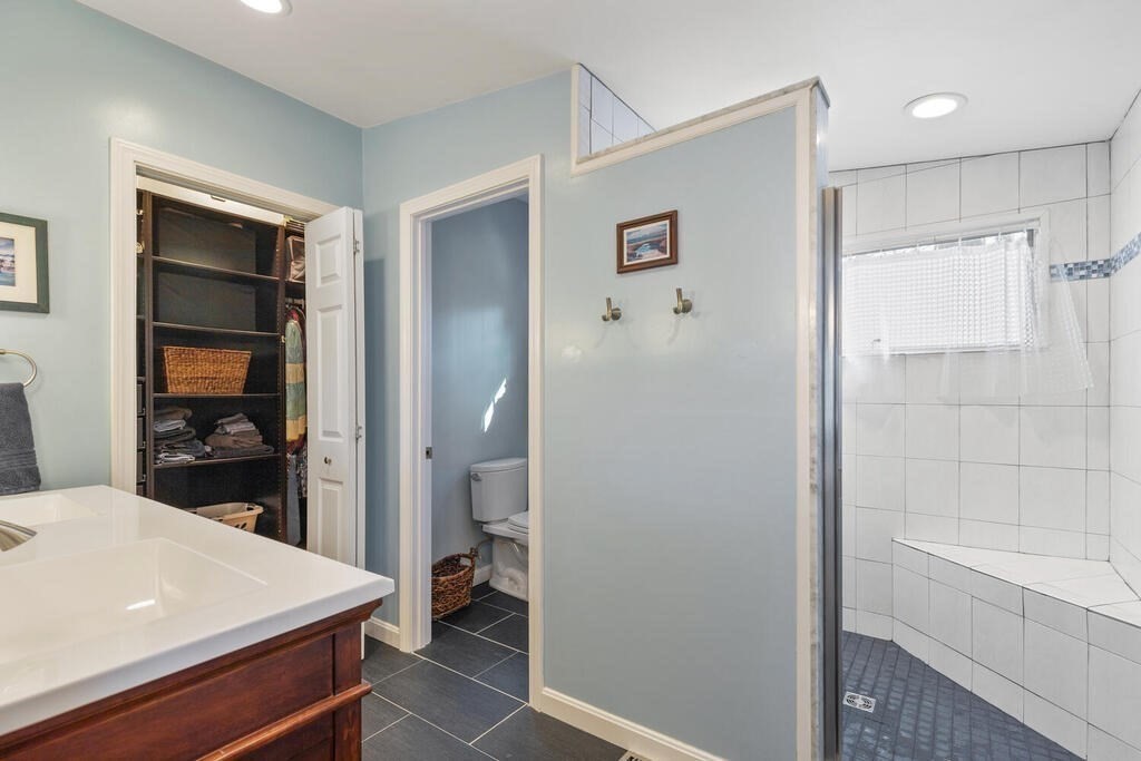 73 Longfellow Road Reading, MA 01867 - Photo 24 of 32 a room that has a toilet and a sink