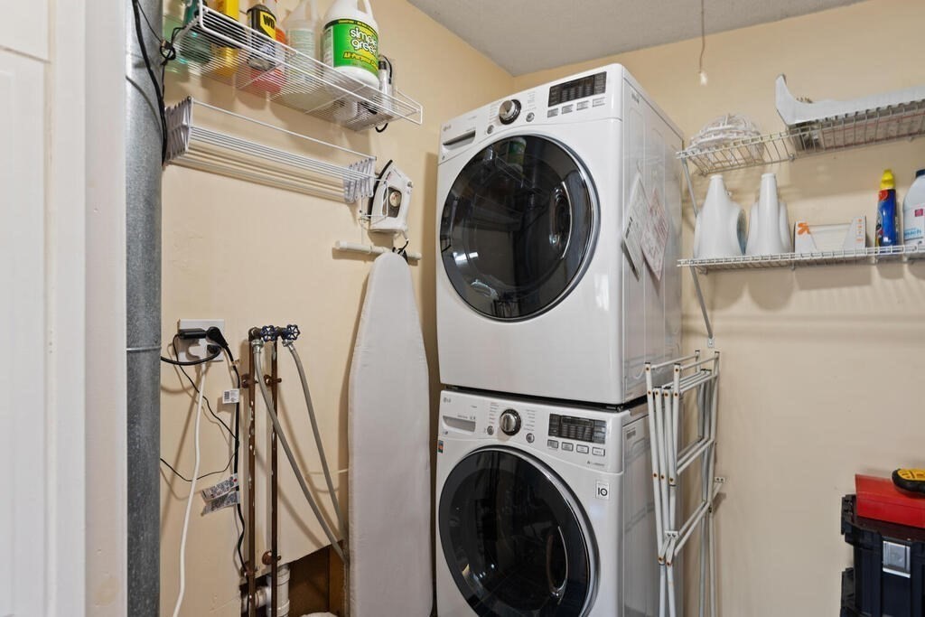 73 Longfellow Road Reading, MA 01867 - Photo 27 of 32 a view of a storage & utility room with a washer dryer
