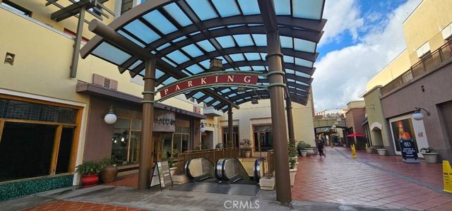 a view of a building with sitting area