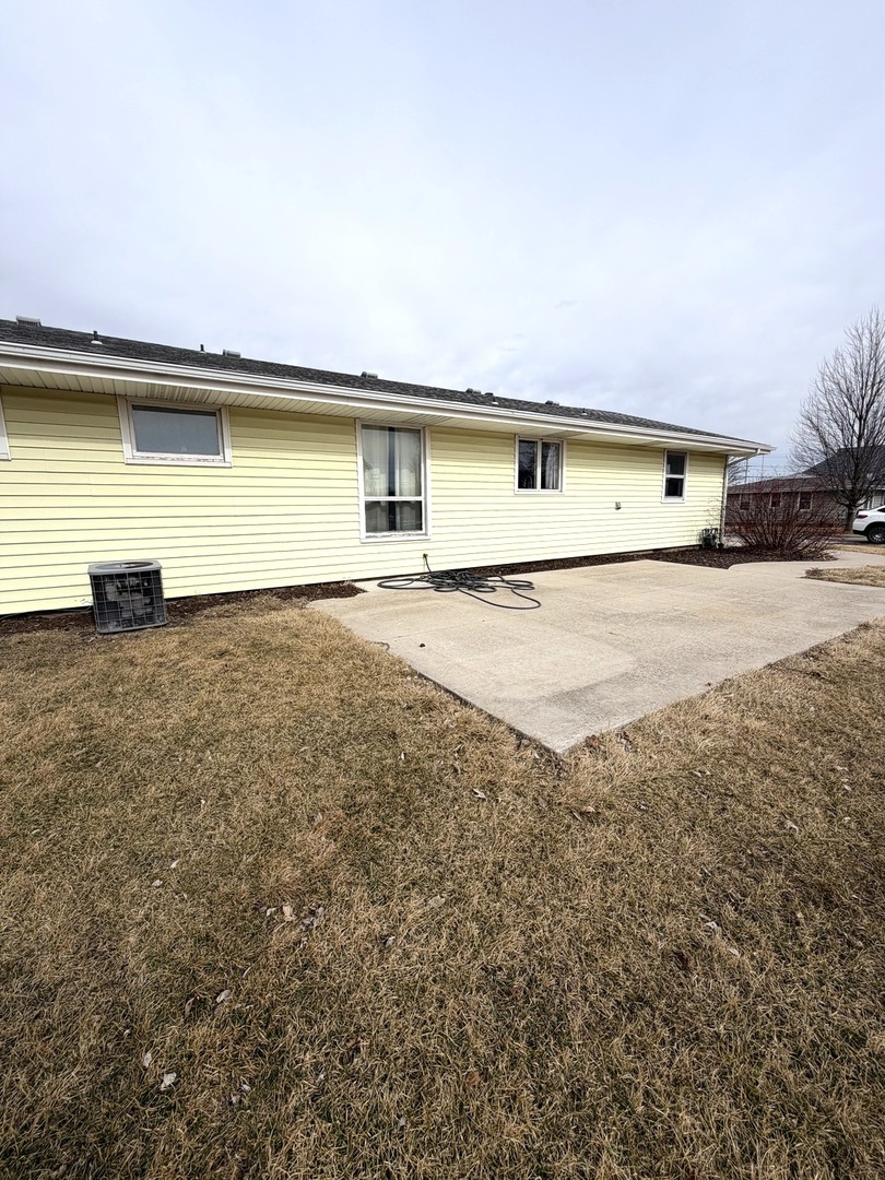 401 North Street Mazon, IL 60444 - Photo 23 of 23 a view of a house with a yard and garage