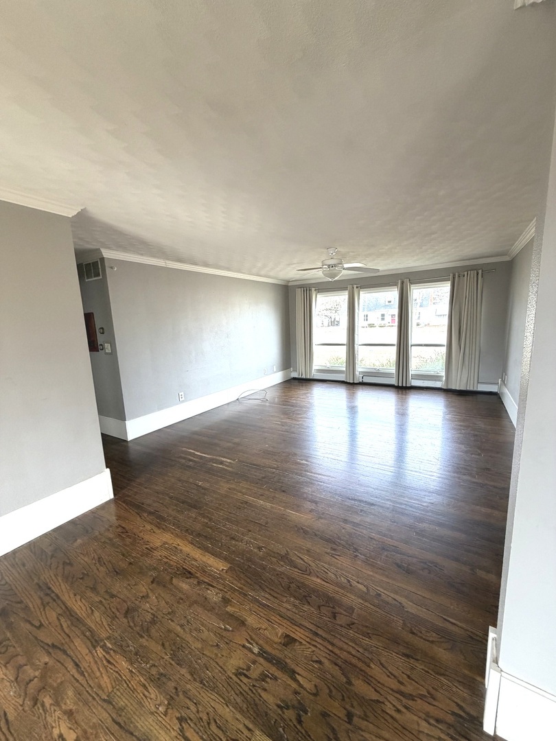 401 North Street Mazon, IL 60444 - Photo 6 of 23 wooden floor in an empty room with a window
