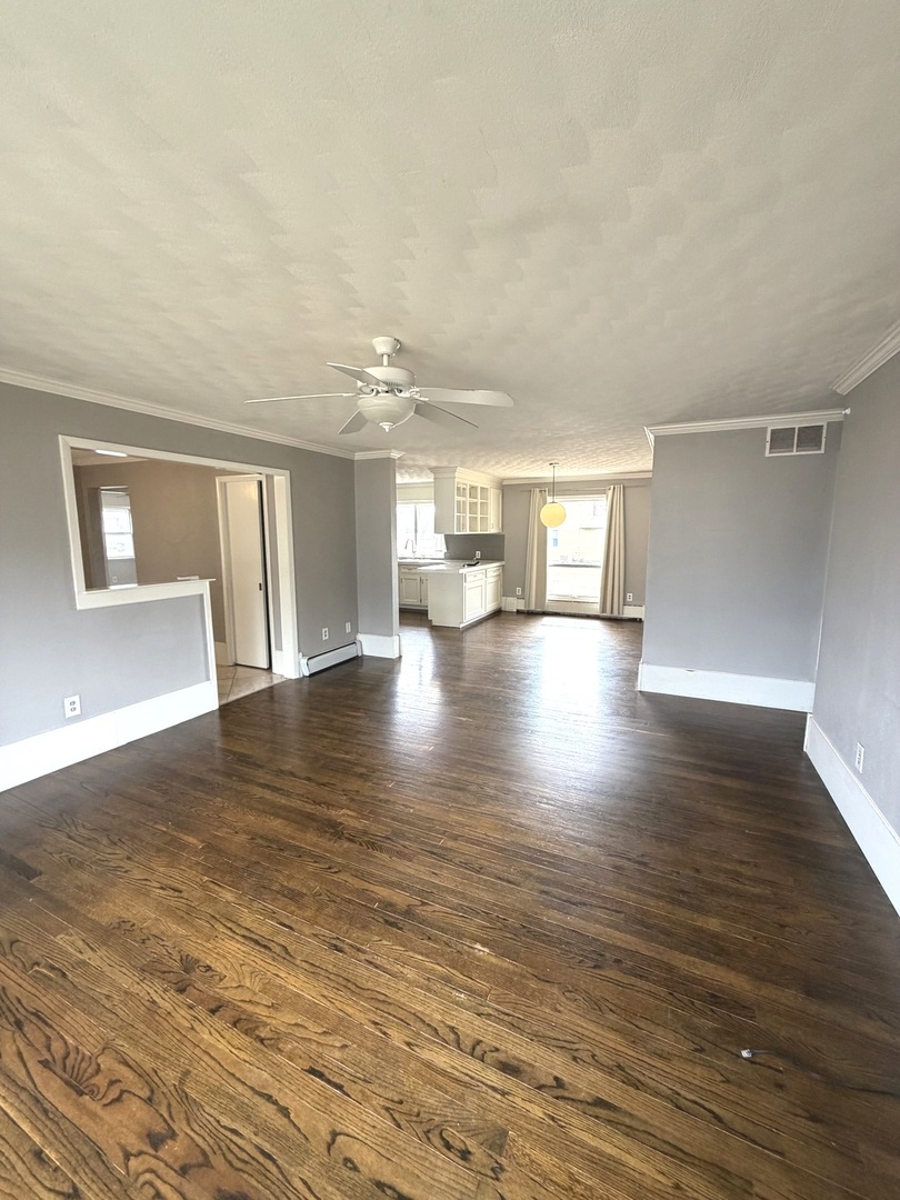 401 North Street Mazon, IL 60444 - Photo 10 of 23 a view of an empty room with window and wooden floor