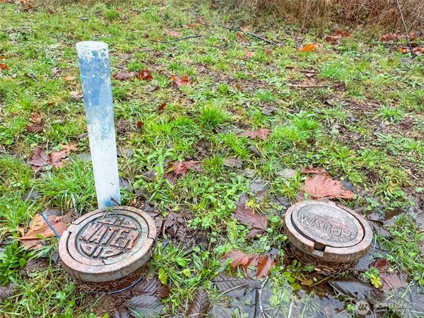 a view of a swimming pool with sitting area