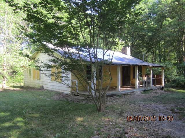 554 Bradshaw Road Thomaston, GA 30286 - Photo 1 of 1 a front view of a house with garden