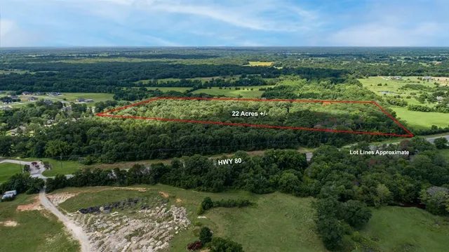 a view of a city with mountains in the background