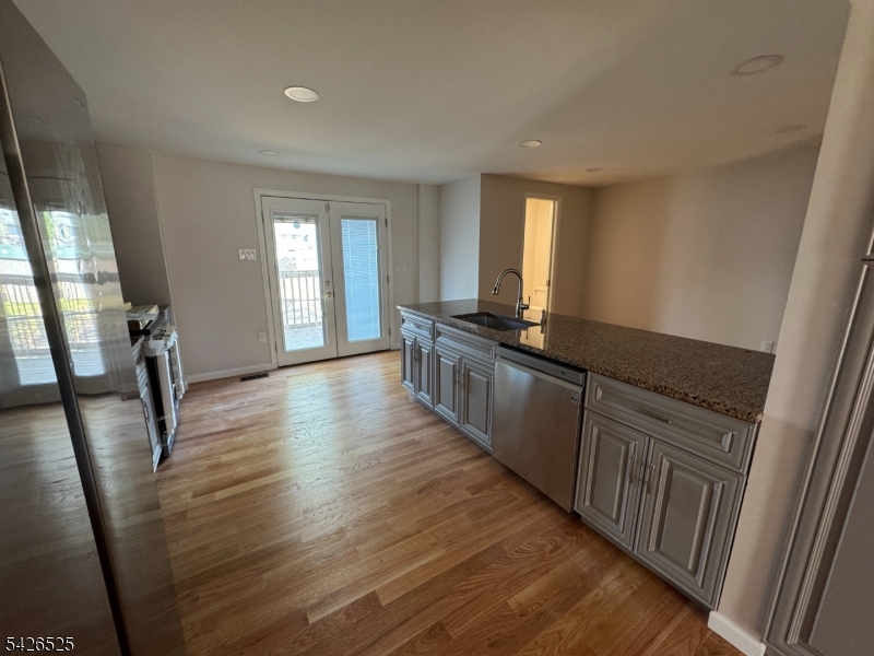 87 Fairview Avenue Somerville, NJ 08876 - Photo 6 of 19 a view of a kitchen cabinets and wooden floor