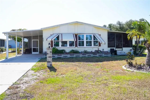 a front view of a house with swimming pool