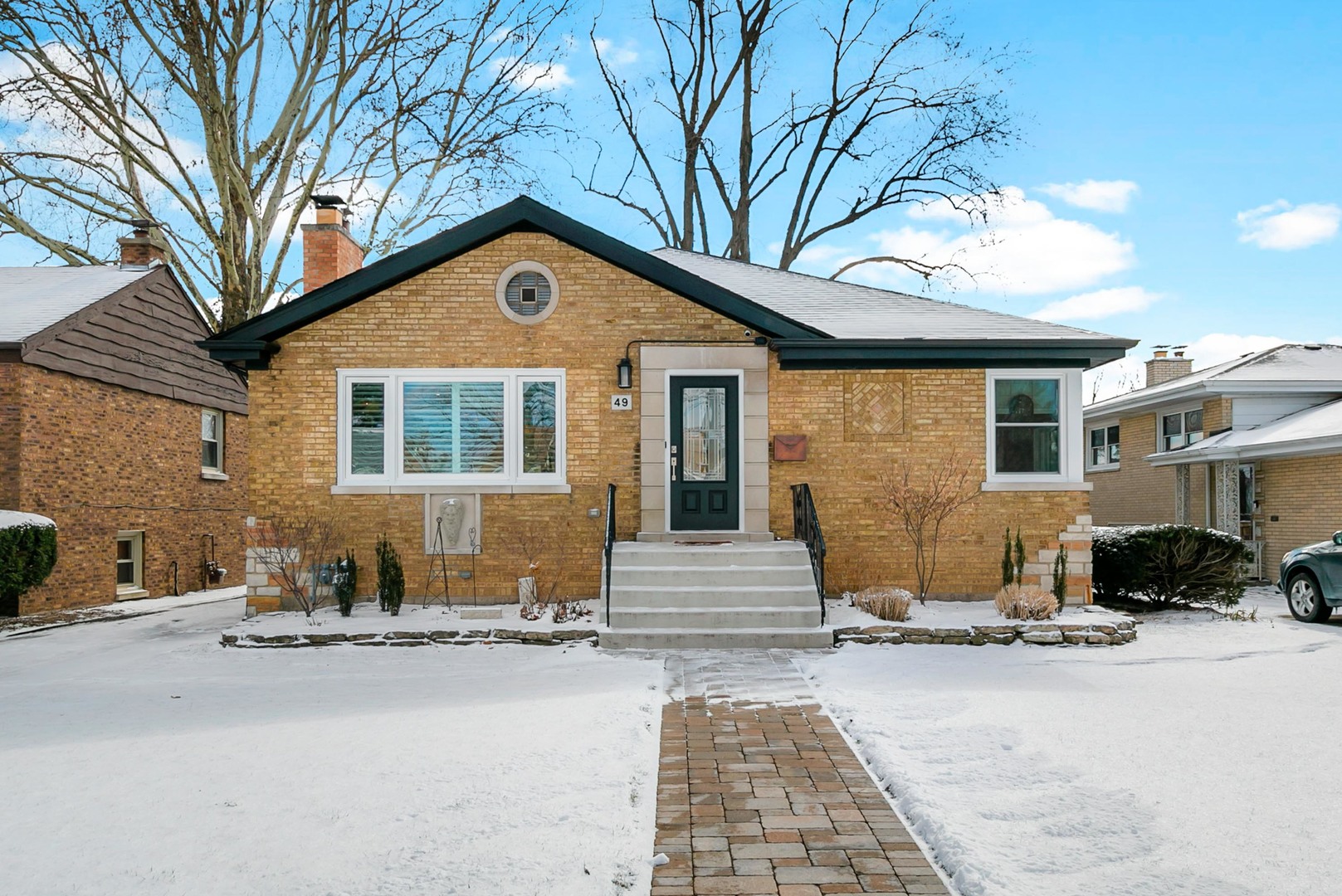 49 Northgate Road Riverside, IL 60546 - Photo 1 of 19 a front view of a house with a yard