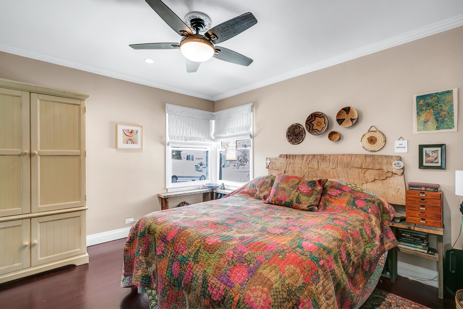 49 Northgate Road Riverside, IL 60546 - Photo 8 of 19 a bedroom with a large bed and a chandelier